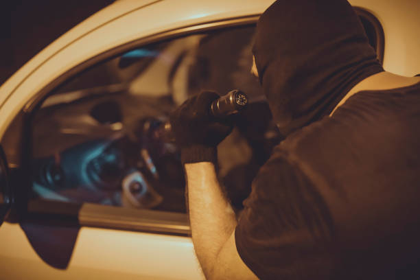 istock Car Burglar Stealing the Vehicle 1132941830