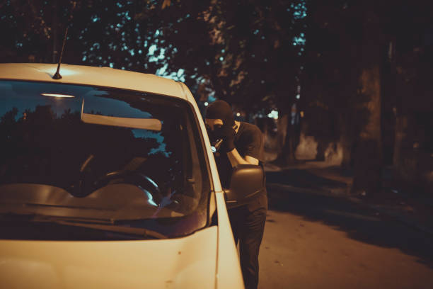 istock Car Burglar Stealing the Vehicle 1132941835