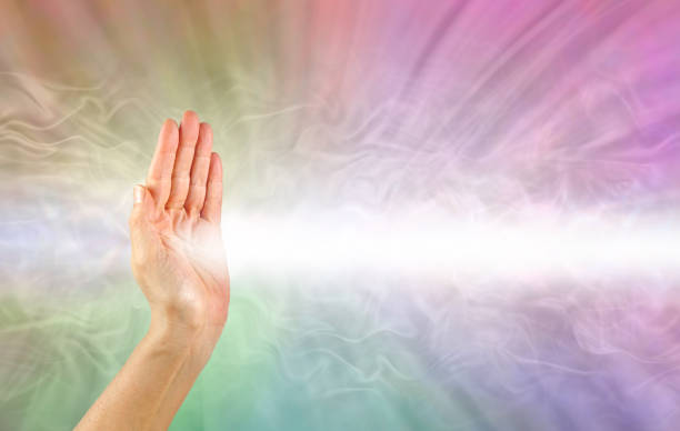 istock Pranic healer using right hand to beam healing energy 1132942750