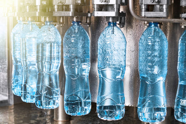 istock Modern automated mineral water bottling line 1132945010