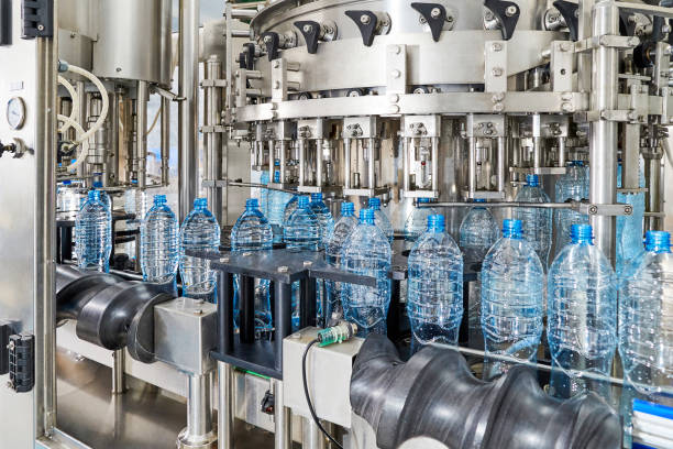 istock Modern automated mineral water bottling line 1132945029