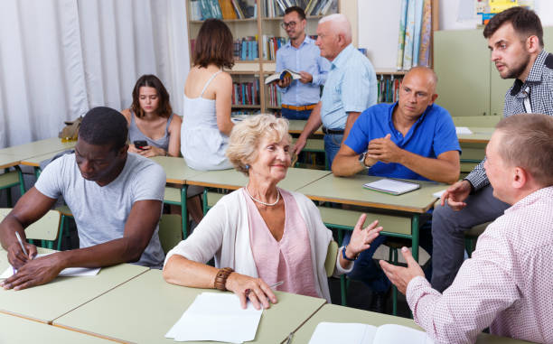 istock Men and women discussion during course 1132945579