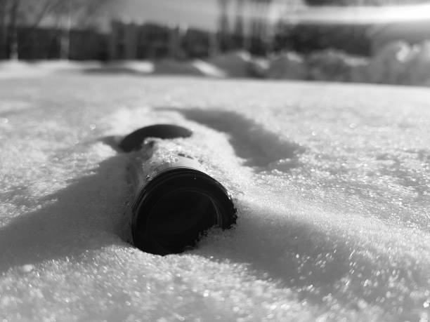 istock beautiful bottle in the snow in winter 1132946992