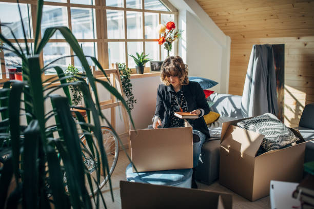 Woman moving in into new apartment