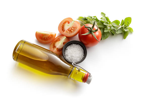 Ingredients: Olive Oil, Tomatoes, Oregano and Salt Isolated on White Background