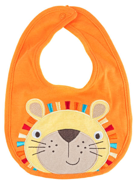 Baby bib isolated on a white background Orange baby bib with lion isolated on a white background baby bib stock pictures, royalty-free photos & images