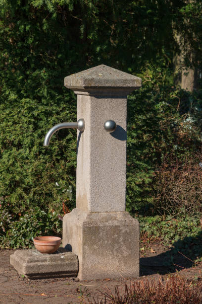 istock Concrete pillar Water dispenser in a park 1132950095