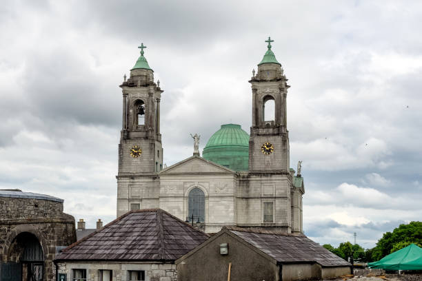 Dramatic, dark and moody views of a historic Presbyterian Church that looks like it is reaching towards Heaven. Captured on an overcast day. Low angle view.