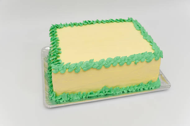 istock Birthday cake with green and yellow colors. Horizontal image. Side view. 1132952321