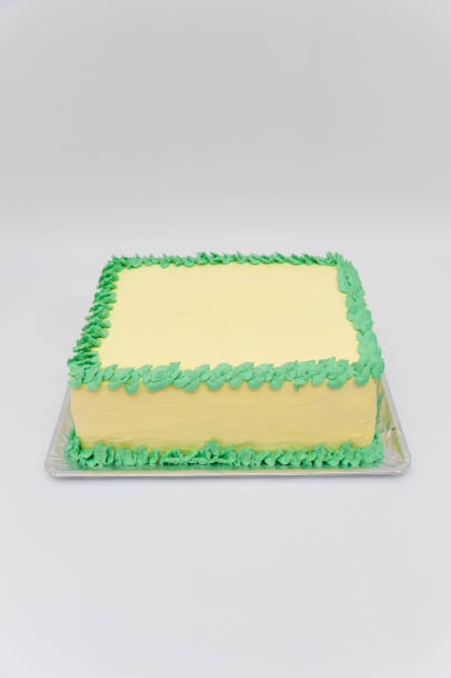 istock Birthday cake with green and yellow colors. Vertical image. Front view. 1132952325