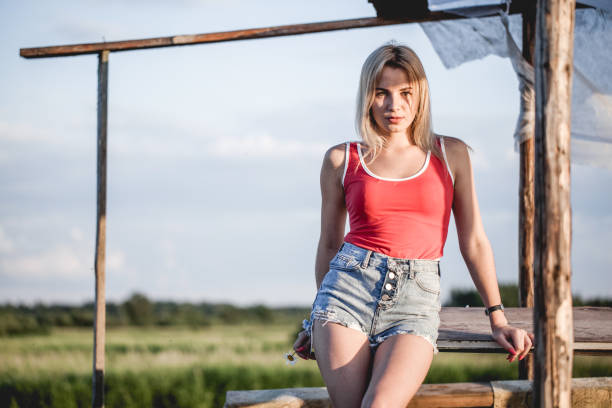 istock young woman sitting under a canopy 1132956517