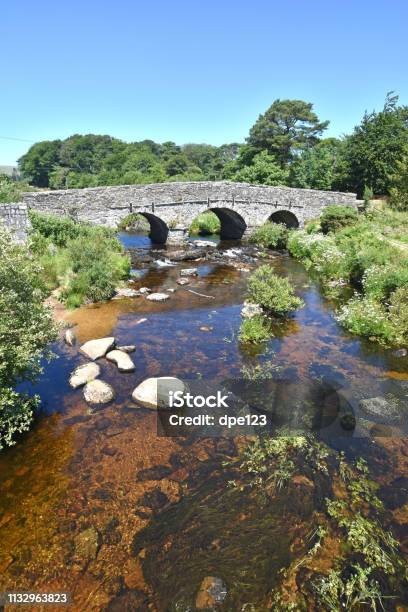 Ancient Stone Clapper Bridge Dartmoor England Stock Photo - Download Image Now - Ancient, Bridge - Built Structure, Clapper Bridge