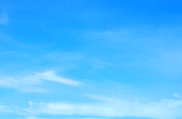 Beautiful blue sky with white fluffy clouds in summer morning peace day as a background