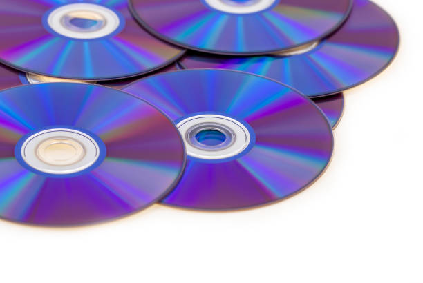 violet blu ray background DVD rom burning isolated on white blu ray disc stock pictures, royalty-free photos & images