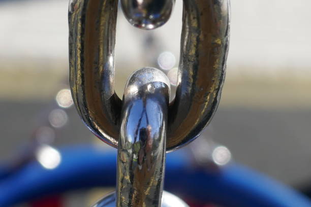 Closeup chain link, abstract background with copy space, full frame horizontal composition