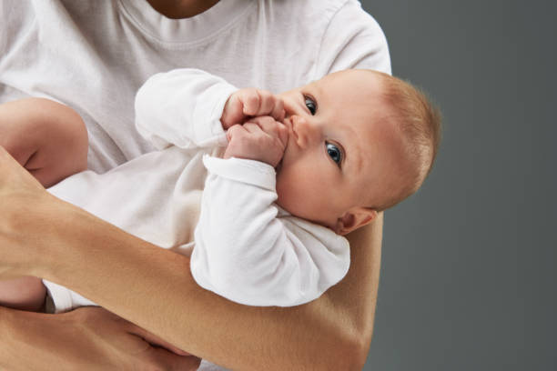 istock Gorgeous baby with calm face looking at camera 1132966029