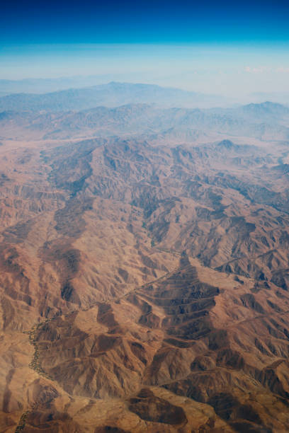istock aerial panoramic view at mountain range from airplane above afghanistan 1132966449