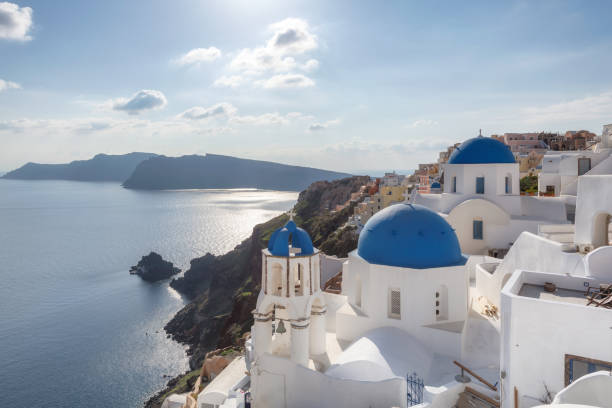 istock White and blue Santorini island at sunset, Greece 1132966489