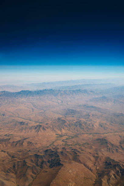 istock aerial panoramic view at mountain range from airplane above afghanistan 1132966755