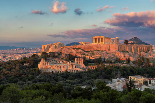 The Acropolis of Athens, Greece. The Acropolis of Athens, with the Parthenon Temple at sunset, Athens, Greece. athens greece stock pictures, royalty-free photos & images