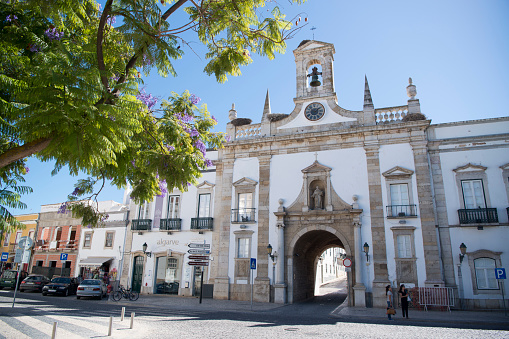 the arco da vila Gatel in the old town of Faro at the east Algarve in the south of Portugal in Europe.