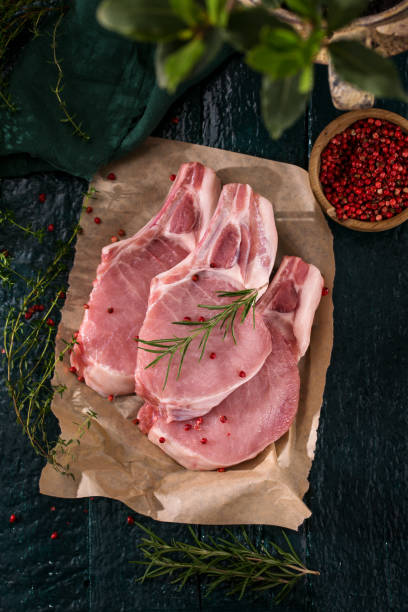 Meat on the bone with spices stock photo