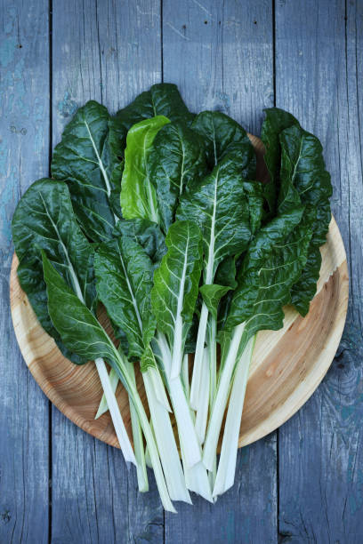 istock fresh chard on a wooden plate 1132969553