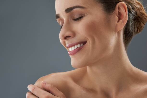 istock Gorgeous woman till head aside and making nice smile 1132969721