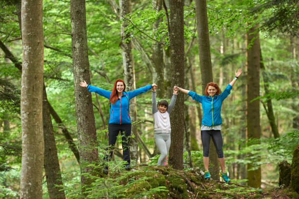 istock family enjoying walk in nature 1132970885