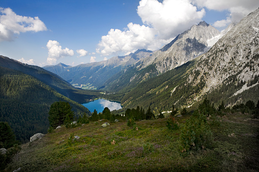 Scenic view at lake Antholz in a beautiful mountain landscape of the Dolomite Alps. Natural landmark in the nature reserve Rieserferner-Ahrn near Antholz. XXXL (Canon Eos 1Ds Mark III)