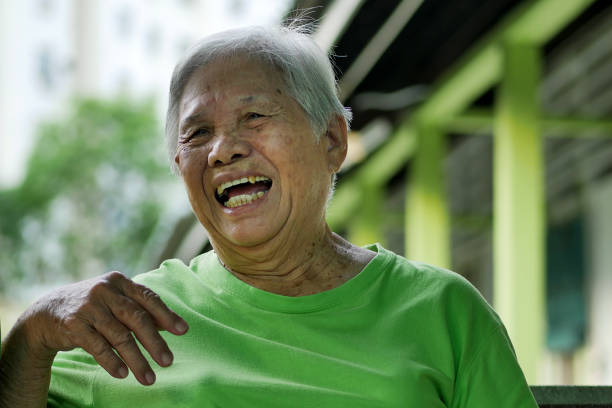 istock Granny Laughing to Her Heart's Content 1132972163