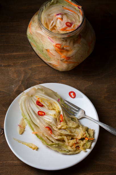 istock Kimchi on wooden background 1132975223