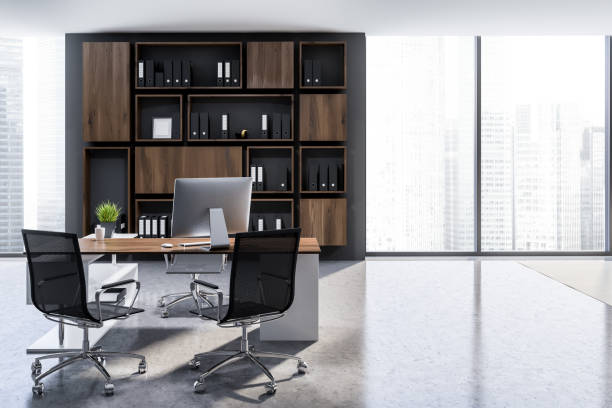 istock Gray ceo office, wooden bookcase 1132976932