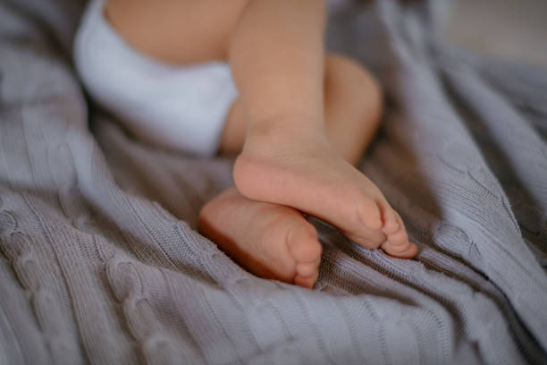 istock Cute baby legs 1132977283