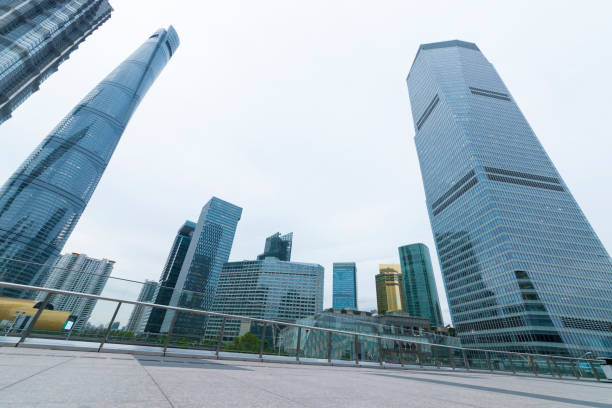 istock The pedestrian pavement under the tall building large building. 1132982509