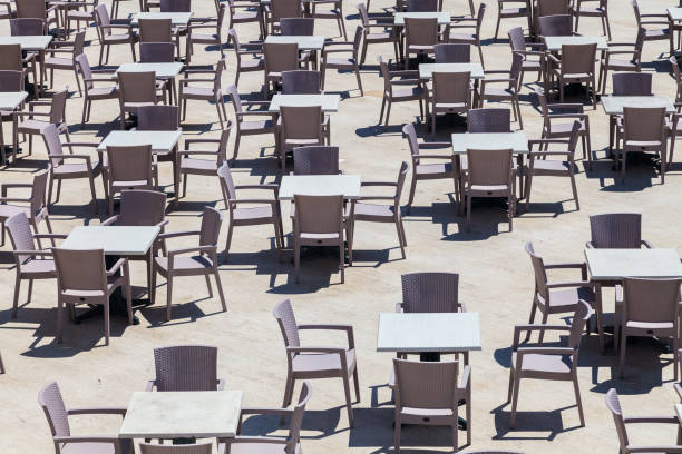 istock Many plastic tables with chairs. Top and perspective view. 1132983371