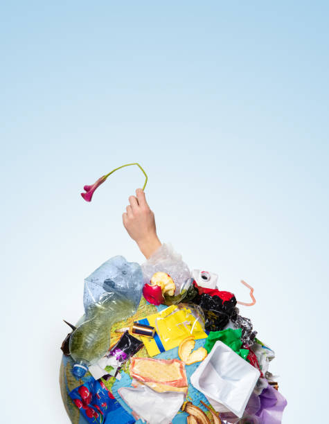 istock A globe of the earth with trash over white background, the concept of ecology problem 1132986105