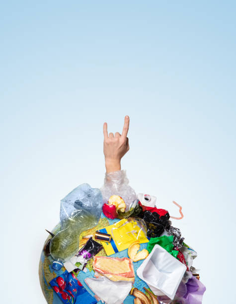 istock A globe of the earth with trash over white background, the concept of ecology problem 1132986112