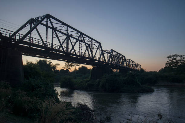 the railway bridge of the world war 2 at the wang river in the city of Lampang in North Thailand.