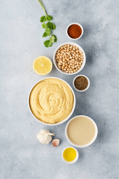 istock Hummus ingredients - chickpea, lemon, garlic, sesame, olive oil 1132986257
