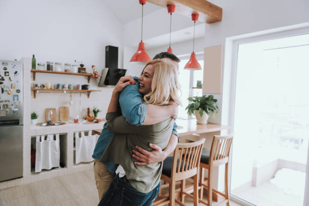 istock Loving husband hugging his beautiful happy wife 1132987225