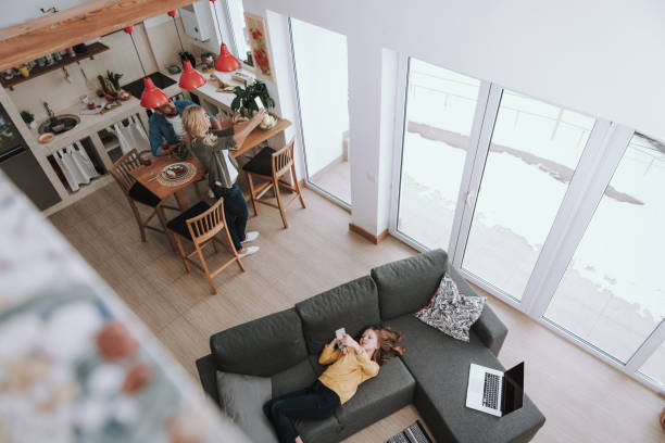 istock Lovely family spending time at home and making selfie 1132987242