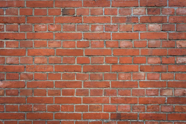 istock red brick wall texture grunge background. modern style background, industrial architecture detail display and montage of product. Interior design concept, background texture with copy spaces. 1132987469
