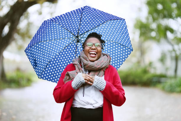 Laughing woman with umbrella