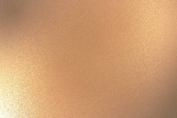istock Abstract background, shiny bronze metal plate texture 1132989089