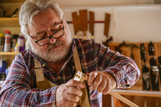 istock Candid portrait of mature carpenter working 1132989097
