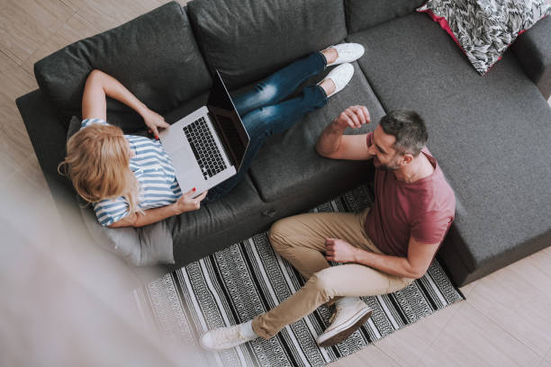 istock Beautiful couple spending time together at home 1132991016