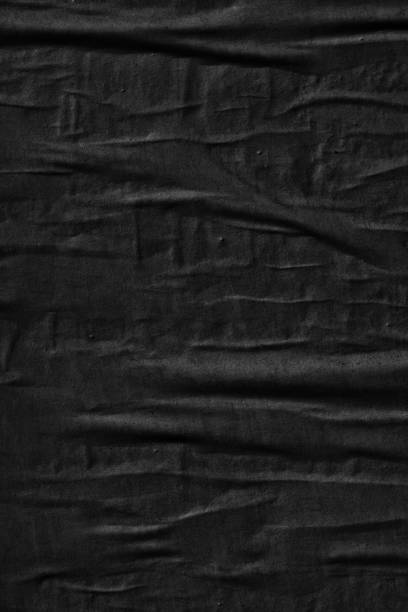 istock Dark black blank paper backgrounds creased crumpled surface old torn ripped posters grunge textures placard 1132991645