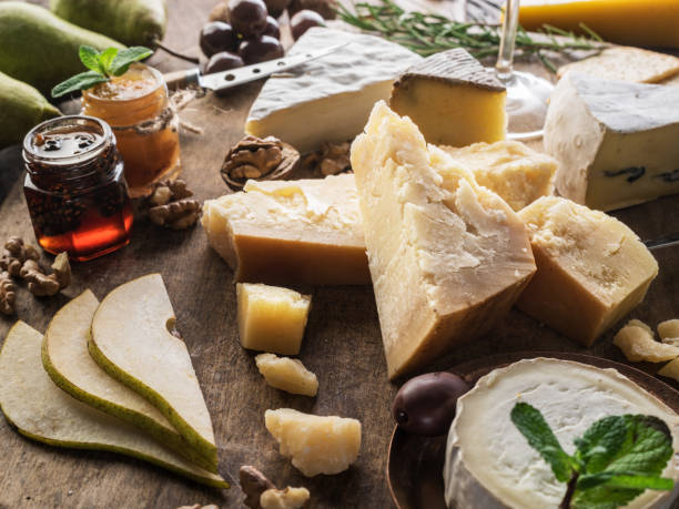 istock Cheese platter with cheeses, fruits, nuts and wine. 1132993121
