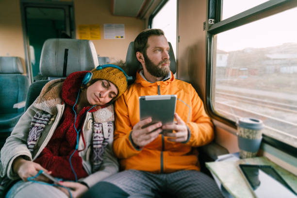 istock Couple traveling with train 1132994489